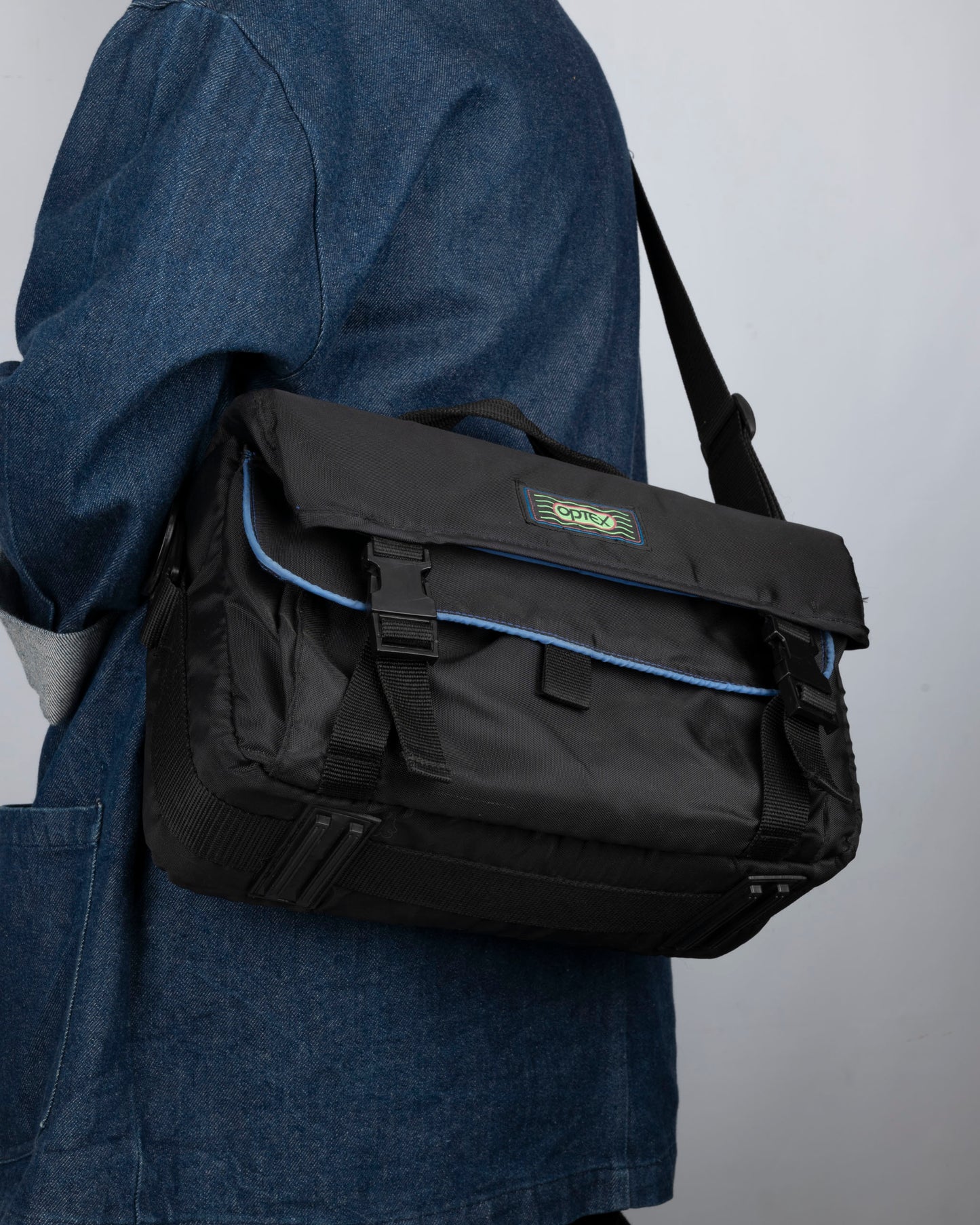 Optex medium-to-large sized black camera bag
