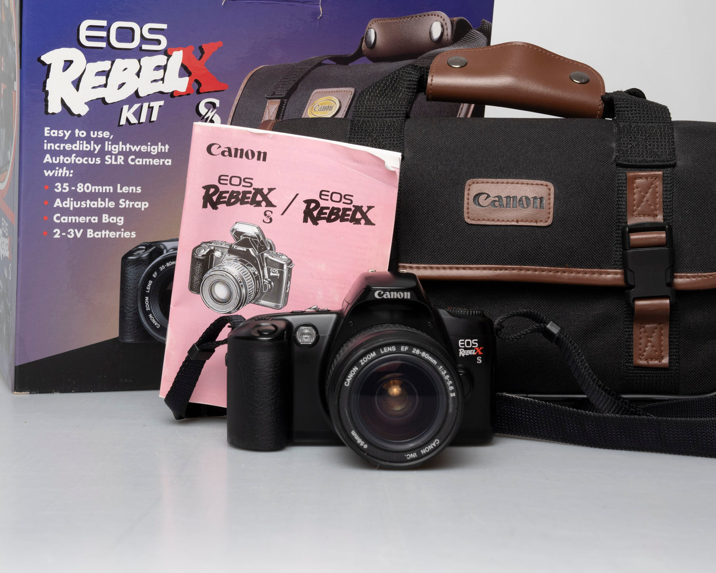 Canon EOS Rebel XS Kit reflex 35mm avec objectif EF 35-80mm + sac pour appareil photo + boîte