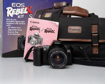 Canon EOS Rebel XS Kit reflex 35mm avec objectif EF 35-80mm + sac pour appareil photo + boîte