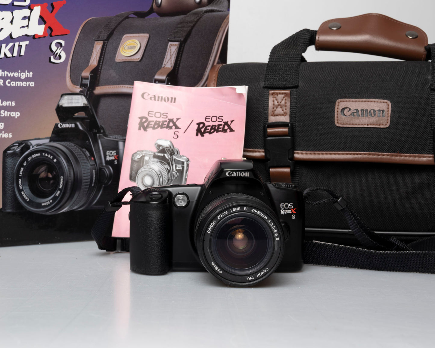 Canon EOS Rebel XS Kit reflex 35mm avec objectif EF 35-80mm + sac pour appareil photo + boîte