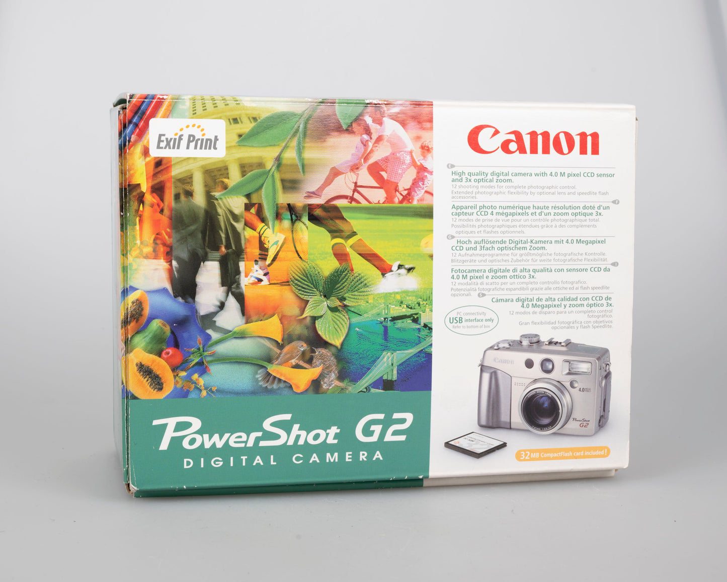 Canon Powershot G2 digicam w/ 4 MP CCD sensor; includes 256MB CF card + 2 batteries w/ charger + original box, manuals & accessories