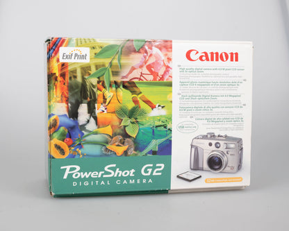 Canon Powershot G2 digicam w/ 4 MP CCD sensor; includes 256MB CF card + 2 batteries w/ charger + original box, manuals & accessories