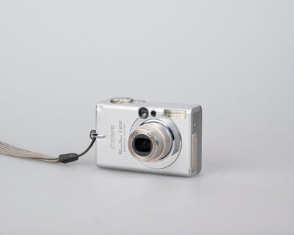 Canon Powershot S500 Digital Elph 5MP CCD digicam w/ 1GB CF card + battery + charger