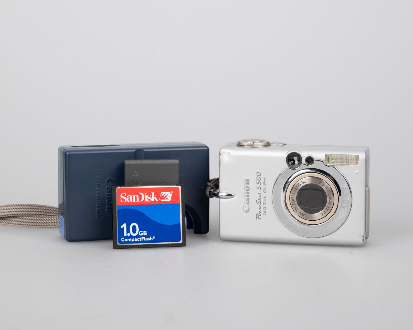 Canon Powershot S500 Digital Elph 5MP CCD digicam w/ 1GB CF card + battery + charger