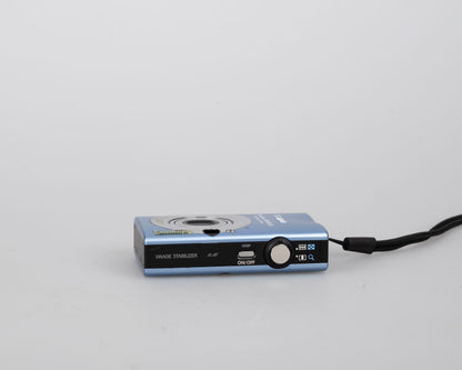 Canon Powershot SD1100 IS Digital Elph 8MP CCD digicam w/ 2GB SD card + batteries + charger + original box + case
