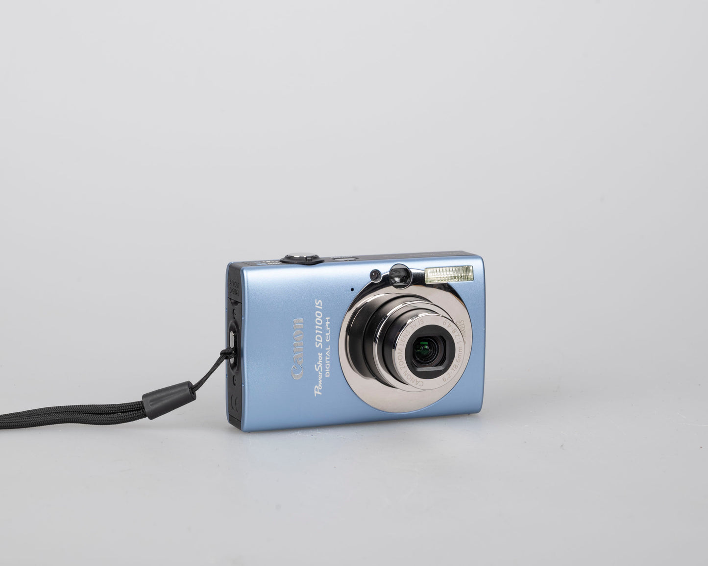 Canon Powershot SD1100 IS Digital Elph 8MP CCD digicam w/ 2GB SD card + batteries + charger + original box + case