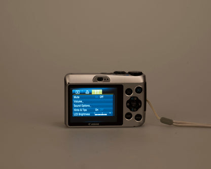 Canon Powershot A1200 digicam w/ 12 MP CCD sensor + 2 GB SD card (uses AA batteries)