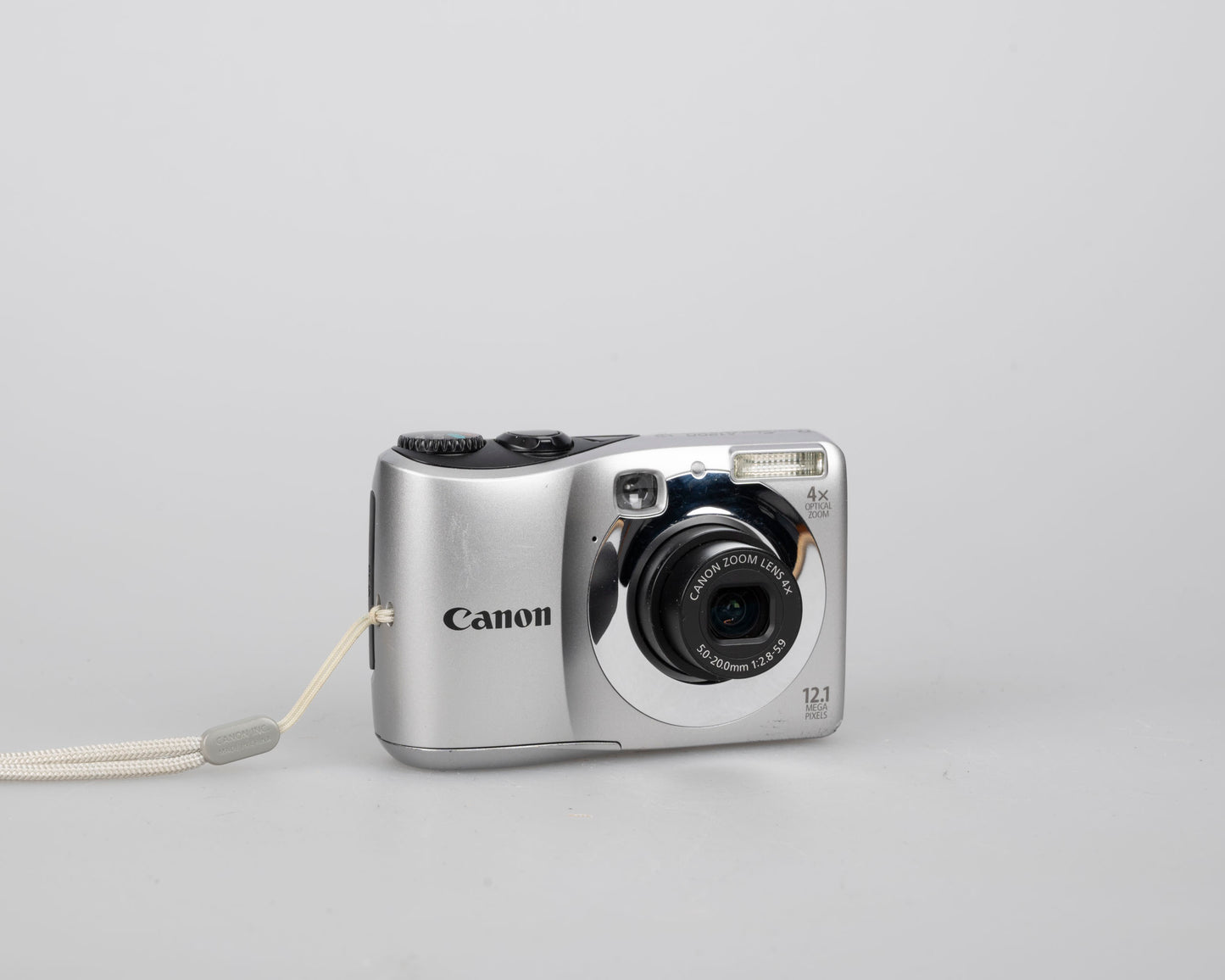 Canon Powershot A1200 digicam w/ 12 MP CCD sensor + 2 GB SD card (uses AA batteries)