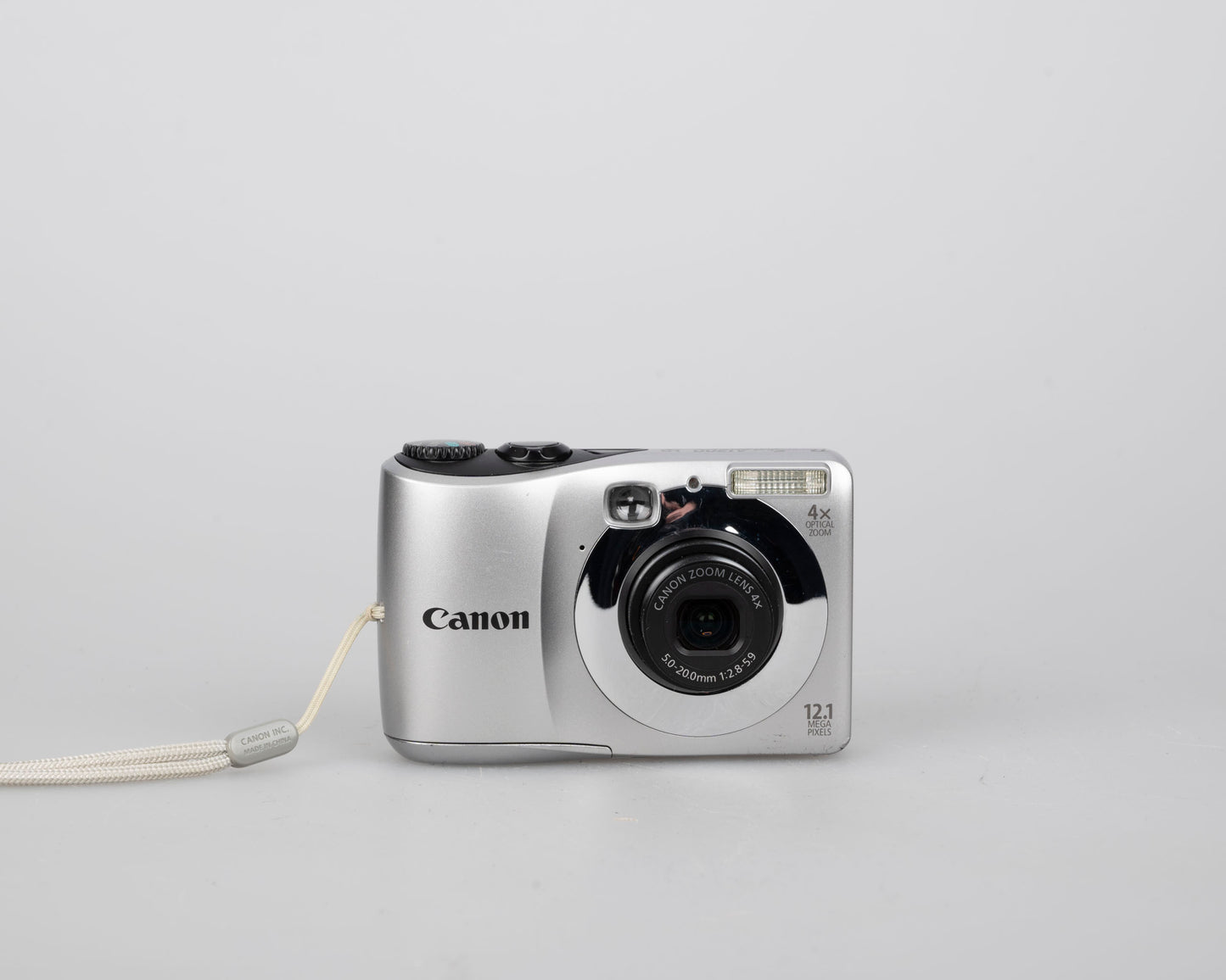 Canon Powershot A1200 digicam w/ 12 MP CCD sensor + 2 GB SD card (uses AA batteries)