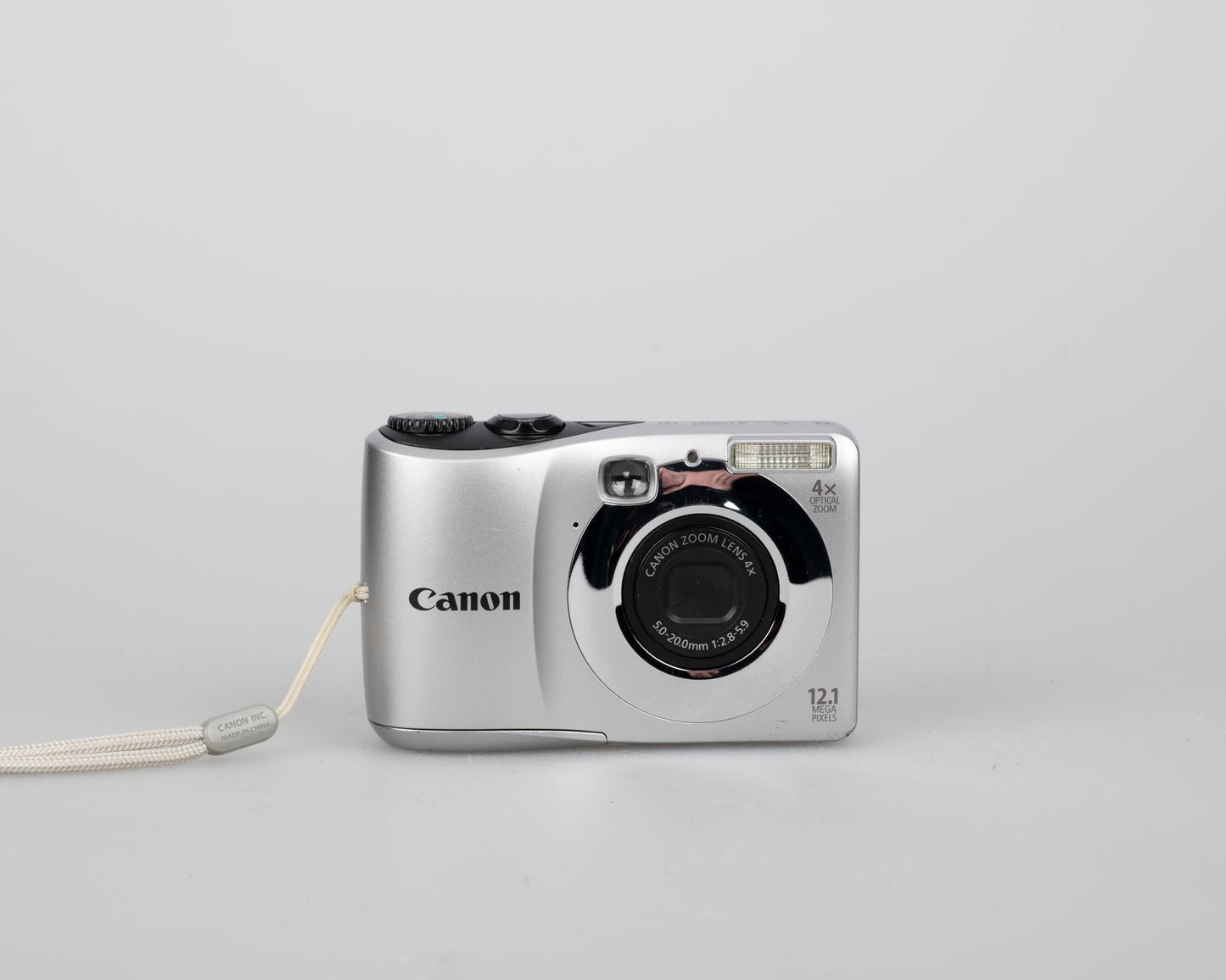 Canon Powershot A1200 digicam w/ 12 MP CCD sensor + 2 GB SD card (uses AA batteries)