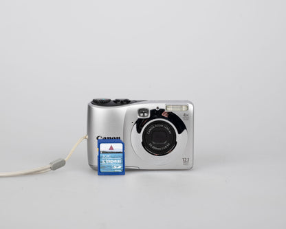 Canon Powershot A1200 digicam w/ 12 MP CCD sensor + 2 GB SD card (uses AA batteries)