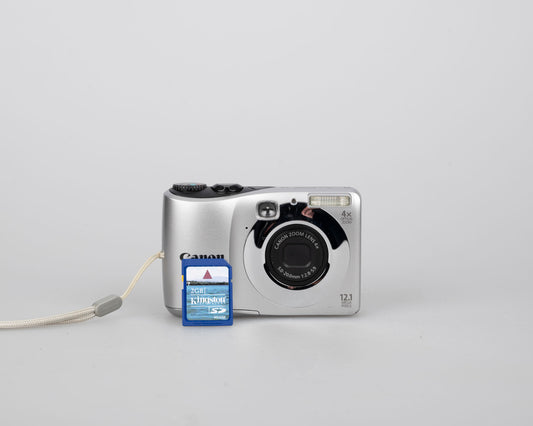 Canon Powershot A1200 digicam w/ 12 MP CCD sensor + 2 GB SD card (uses AA batteries)