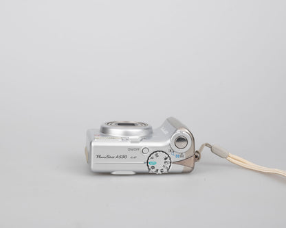Canon Powershot A530 digicam w/ 5 MP CCD sensor; includes 512MB SD card (uses AA batteries) + original box & manual