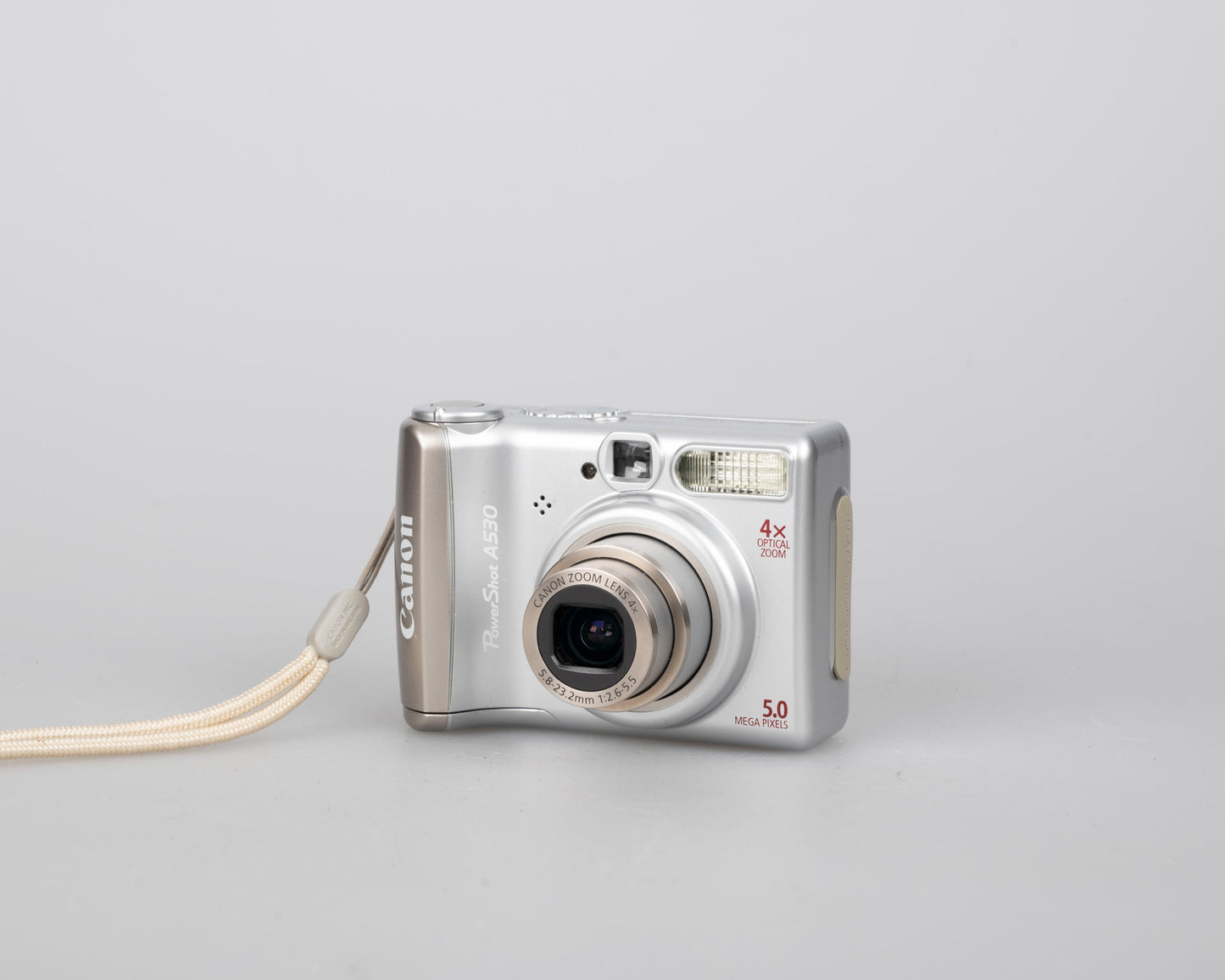 Canon Powershot A530 digicam w/ 5 MP CCD sensor; includes 512MB SD card (uses AA batteries) + original box & manual