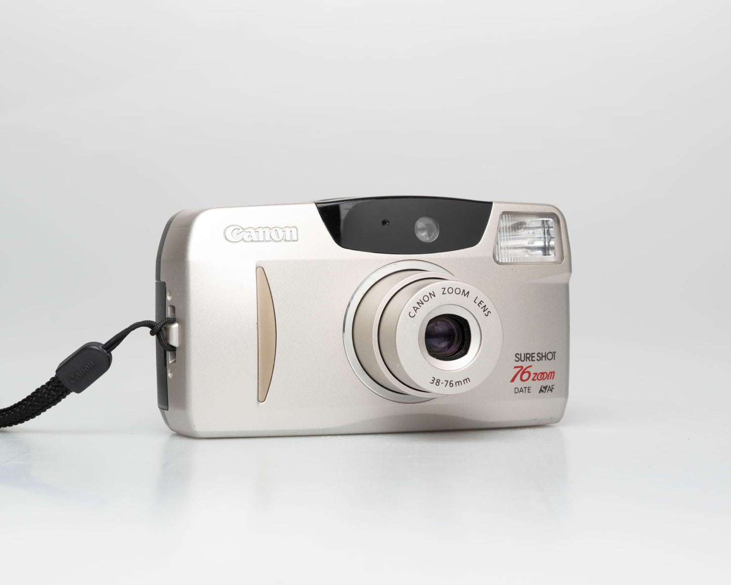 Canon Sure Shot Zoom 76 Date 35mm film camera w/ case (serial 4575391)