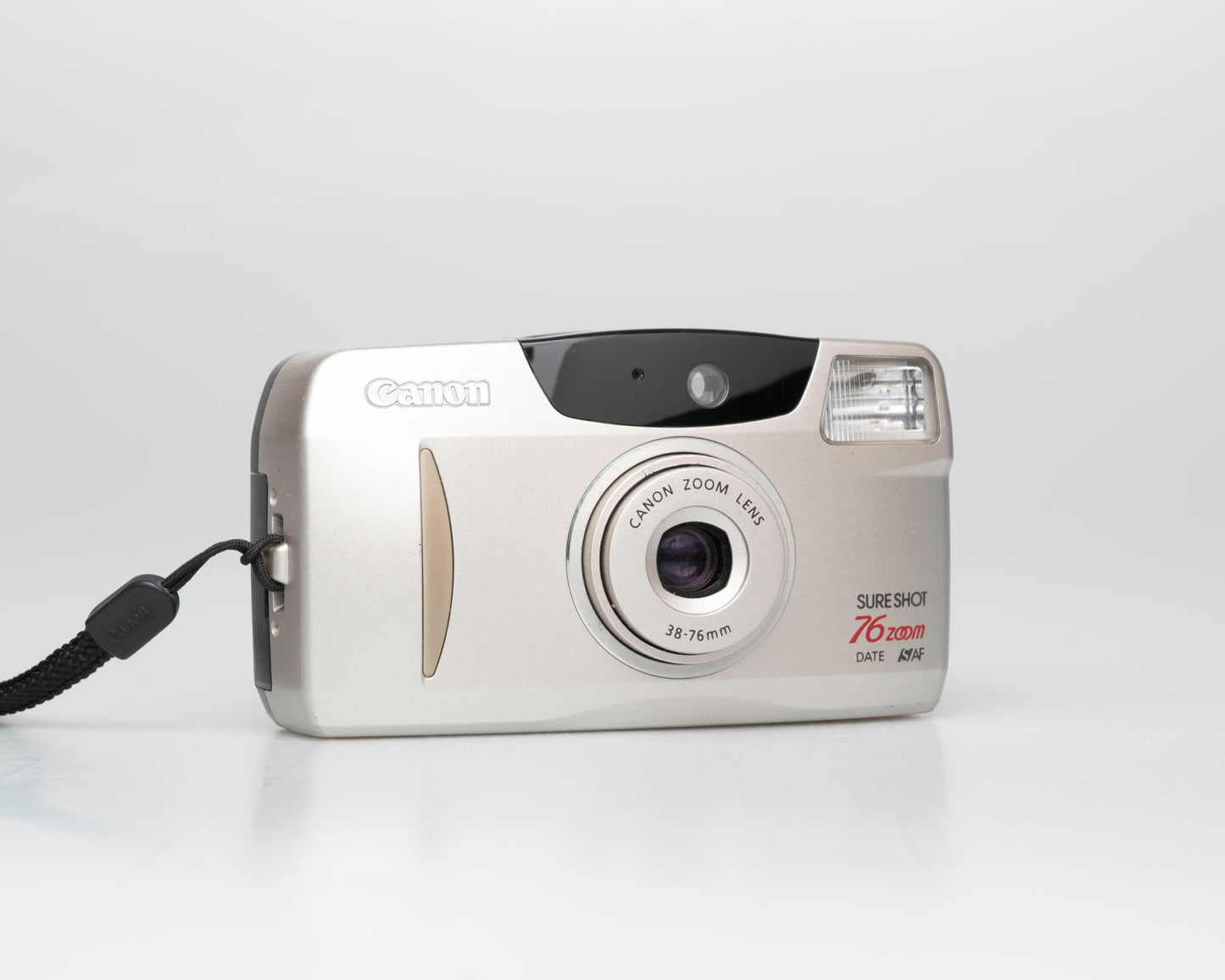 Canon Sure Shot Zoom 76 Date 35mm film camera w/ case (serial 4575391)