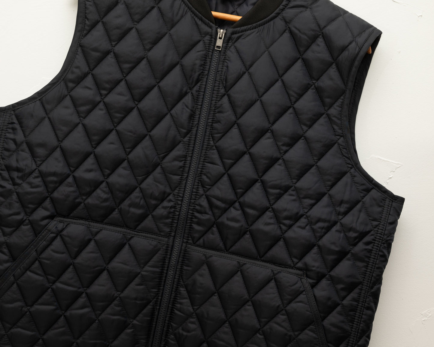 Black quilted vest