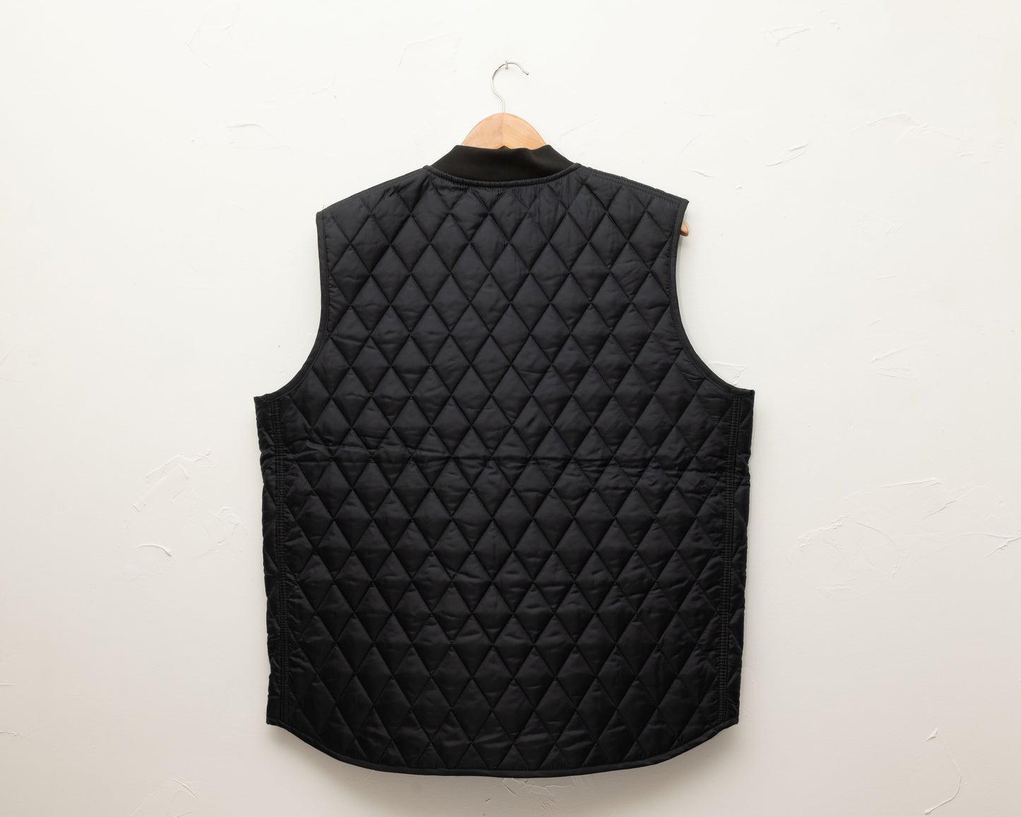 Black quilted vest
