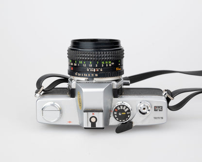 Minolta SRT 200 35mm SLR w/ Rokkor 50mm f1.7 lens + ever-ready case (serial 7527170)