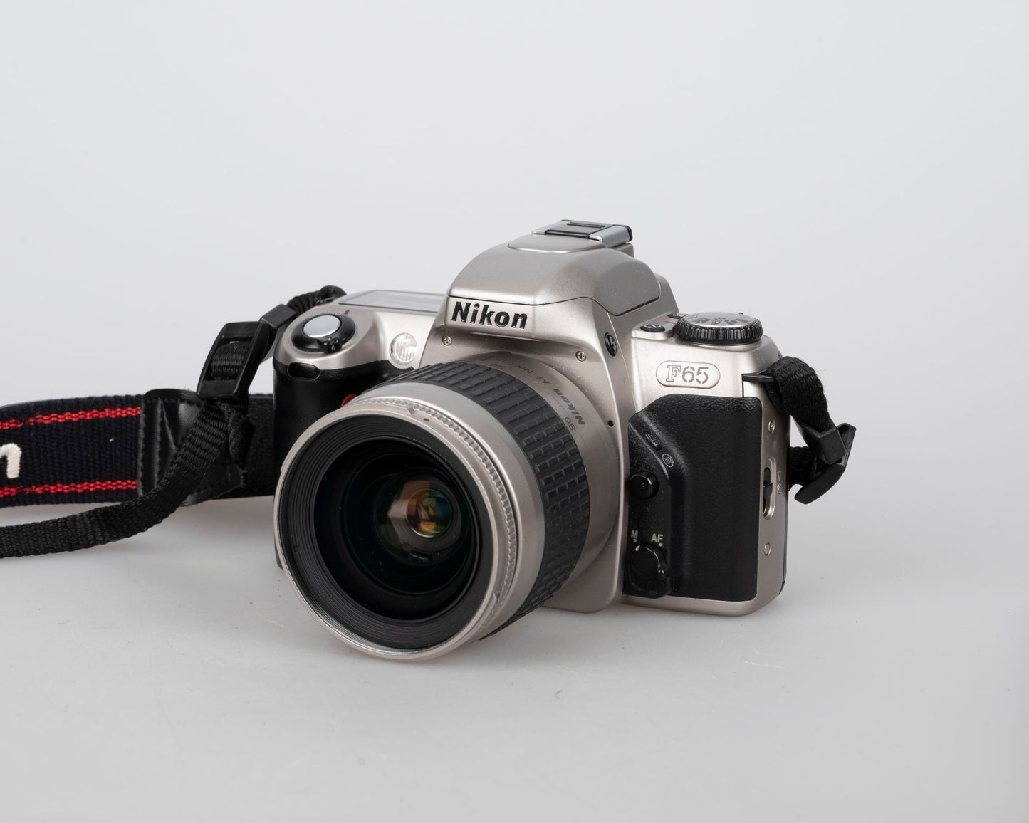 Nikon F65 (aka N65) 35mm film SLR w/ AF Nikkor 28-80mm lens (serial 216507)