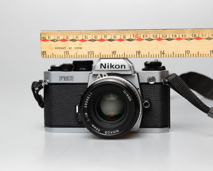 Nikon FM2n 35mm film SLR camera w/ Nikkor 50mm f1.8 lens (serial 8703699)
