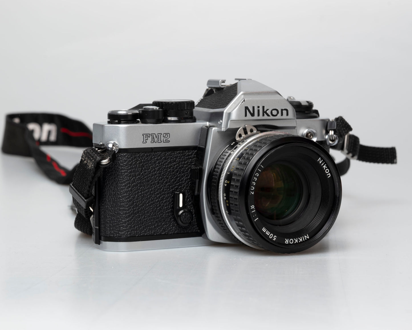 Nikon FM2n 35mm film SLR camera w/ Nikkor 50mm f1.8 lens (serial 8703699)