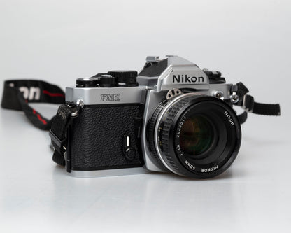 Nikon FM2n 35mm film SLR camera w/ Nikkor 50mm f1.8 lens (serial 8703699)