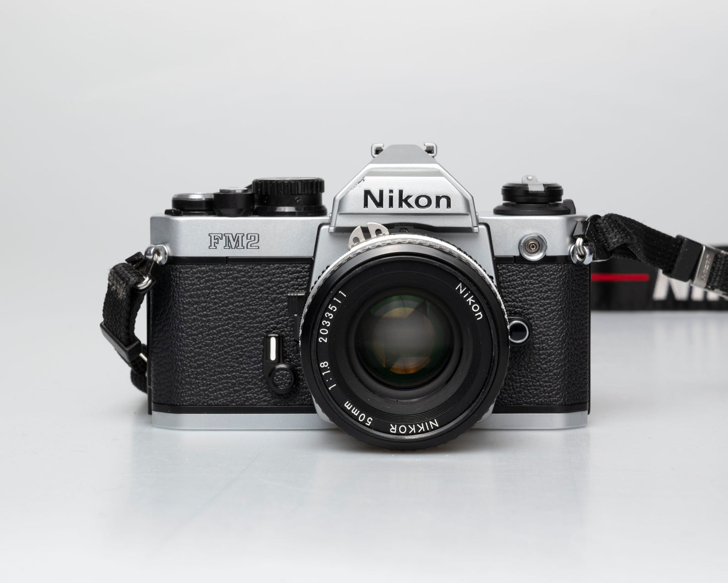 Nikon FM2n 35mm film SLR camera w/ Nikkor 50mm f1.8 lens (serial 8703699)
