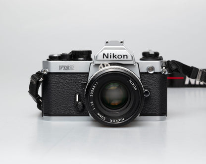 Nikon FM2n 35mm film SLR camera w/ Nikkor 50mm f1.8 lens (serial 8703699)