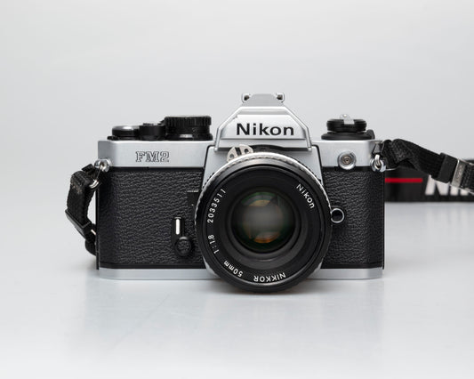 Nikon FM2n 35mm film SLR camera w/ Nikkor 50mm f1.8 lens (serial 8703699)