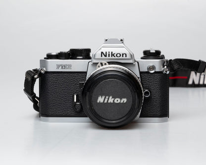 Nikon FM2n 35mm film SLR camera w/ Nikkor 50mm f1.8 lens (serial 8703699)