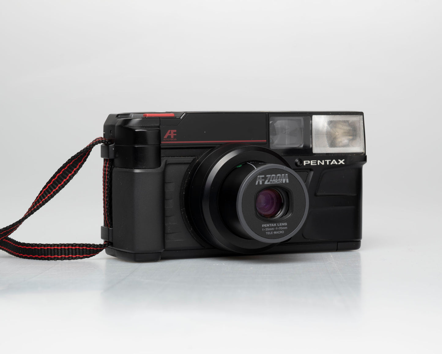 Pentax Zoom-70 (IQZoom) 35mm camera w/case (serial 5186332)