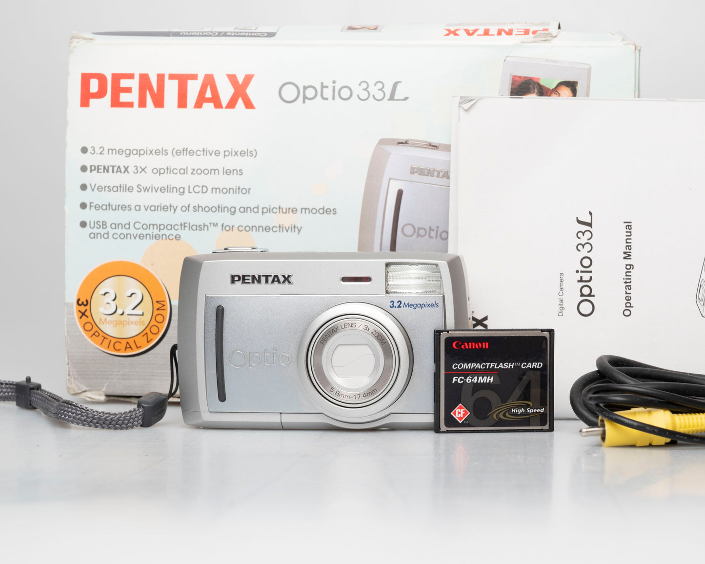Pentax Optio 33L 3.2 megapixel digicam w/ 64MB CF card + cables + box + manuals (serial 6463008)