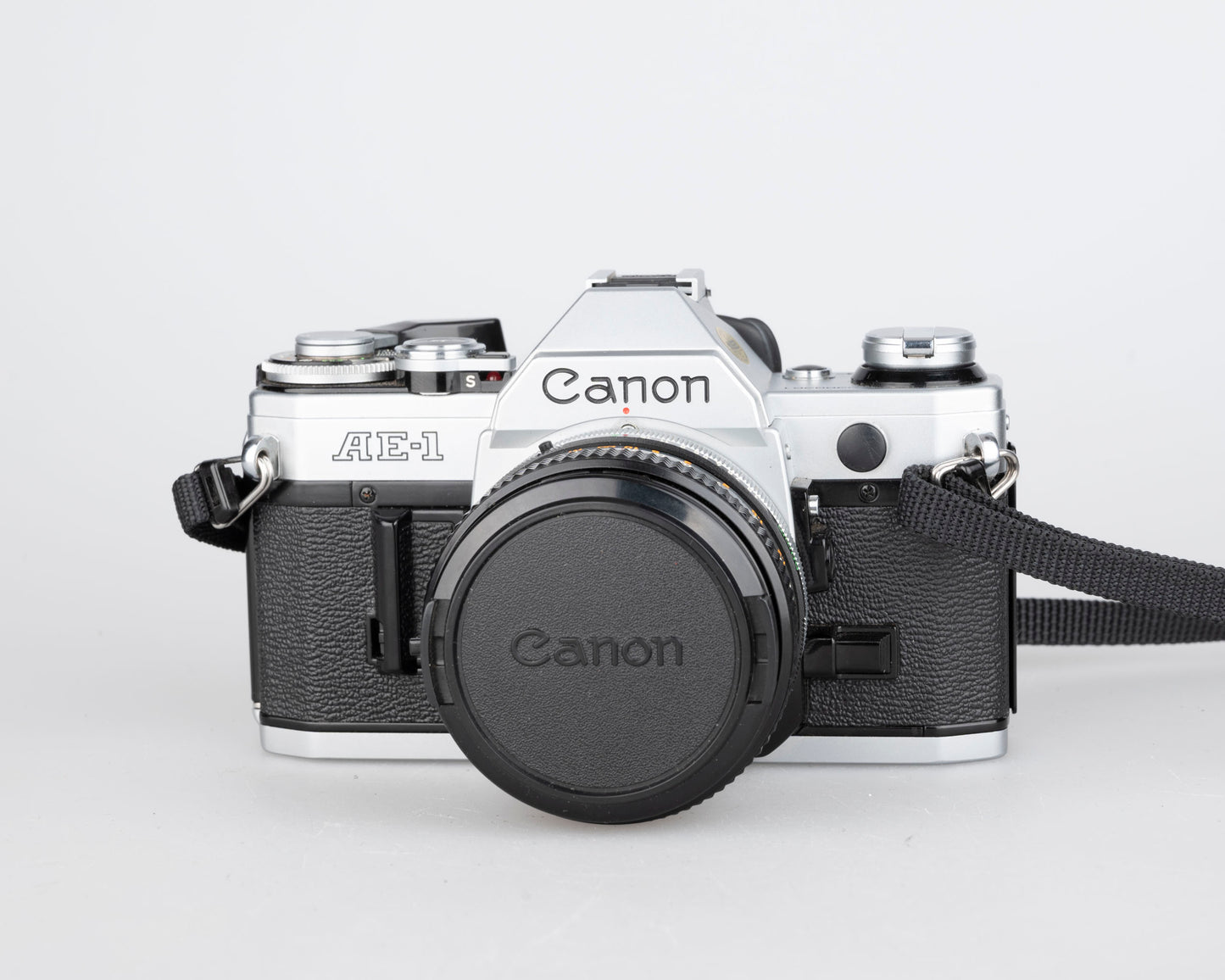 Canon AE-1 35mm SLR w/ Canon FD 50mm f1.8 lens + Speedlite 188A flash + original manual (serial 2388361)