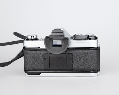 Canon AE-1 35mm SLR w/ Canon FD 50mm f1.8 lens + Speedlite 188A flash + original manual (serial 2388361)