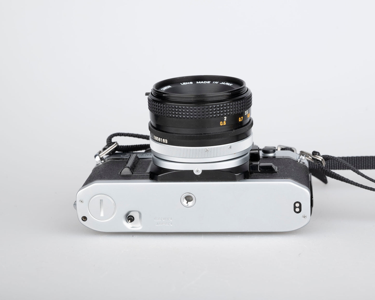 Canon AE-1 35mm SLR w/ Canon FD 50mm f1.8 lens + Speedlite 188A flash + original manual (serial 2388361)
