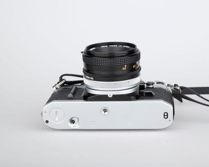 Canon AE-1 35mm SLR w/ Canon FD 50mm f1.8 lens + Speedlite 188A flash + original manual (serial 2388361)