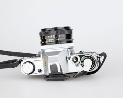 Canon AE-1 35mm SLR w/ Canon FD 50mm f1.8 lens + Speedlite 188A flash + original manual (serial 2388361)