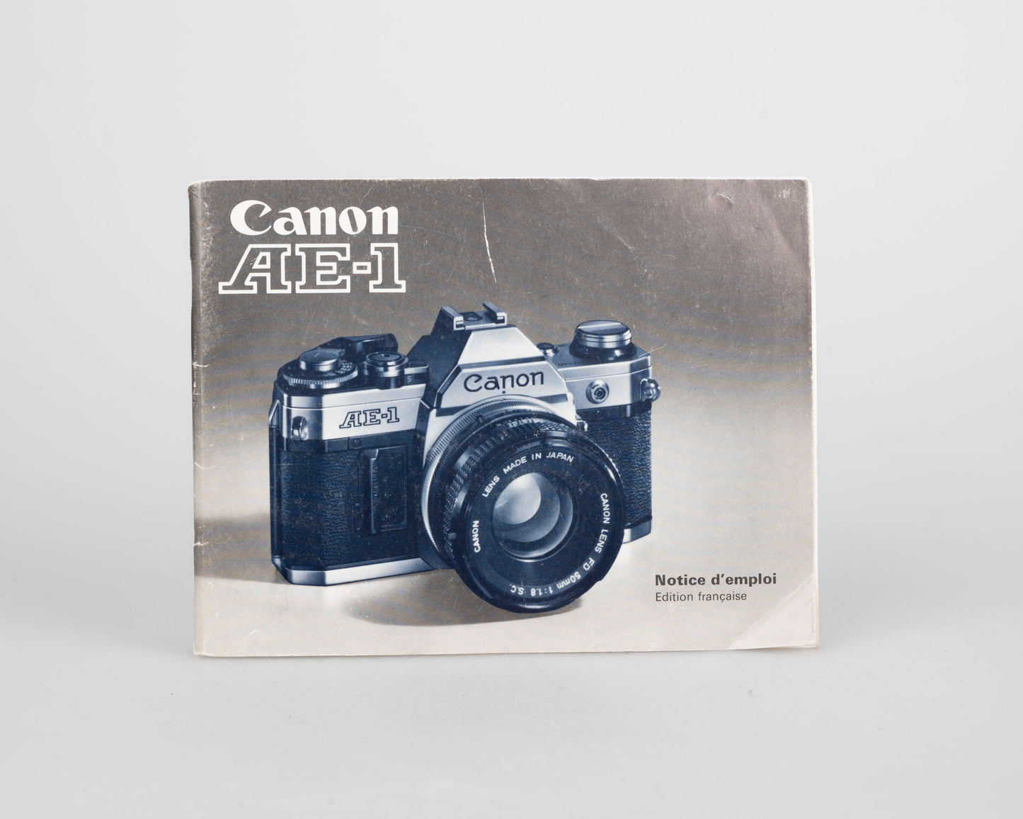 Canon AE-1 35mm SLR w/ Canon FD 50mm f1.4 S.S.C. lens + original manual (serial 291207)