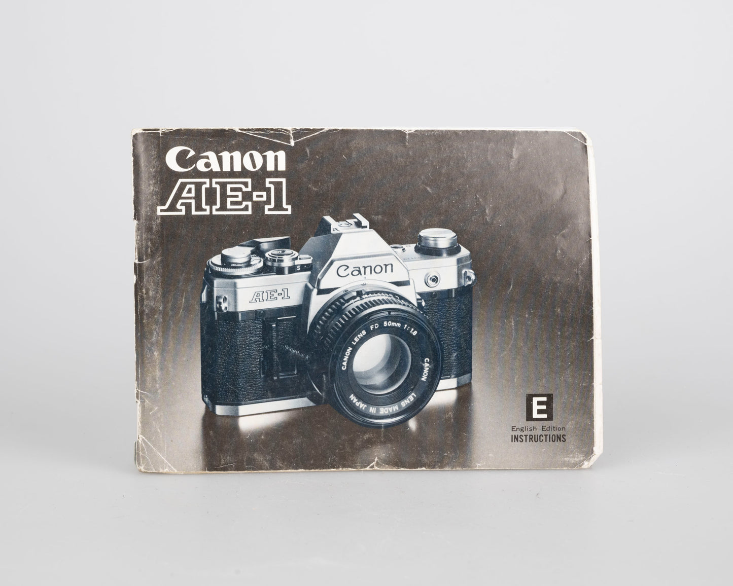 Canon AE-1 35mm SLR w/ Canon FD 50mm f1.4 S.S.C. lens + original manual (serial 291207)