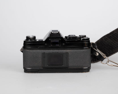 Canon AE-1 35mm SLR w/ Canon FD 50mm f1.4 S.S.C. lens + original manual (serial 291207)