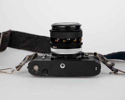 Canon AE-1 35mm SLR w/ Canon FD 50mm f1.4 S.S.C. lens + original manual (serial 291207)
