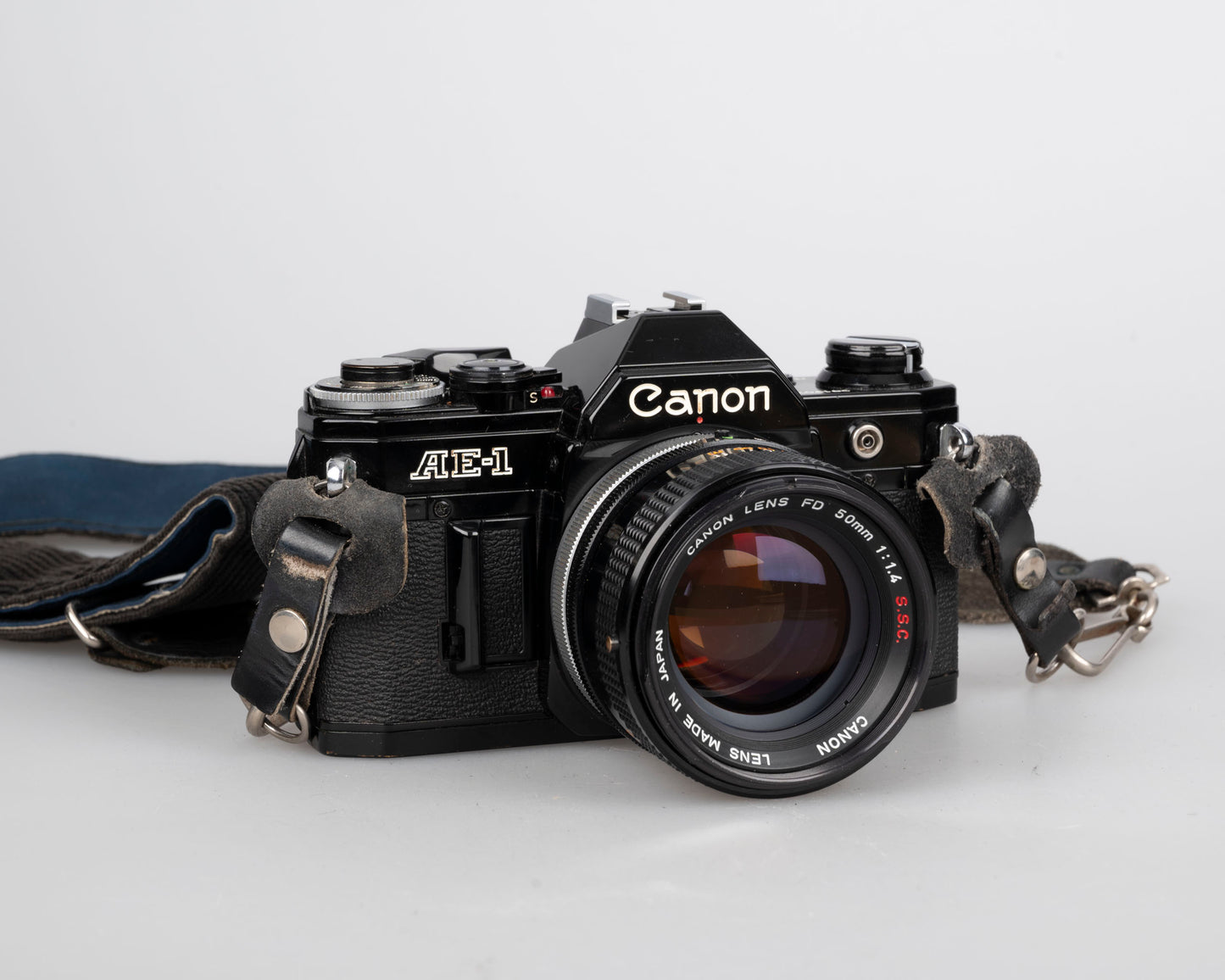 Canon AE-1 35mm SLR w/ Canon FD 50mm f1.4 S.S.C. lens + original manual (serial 291207)