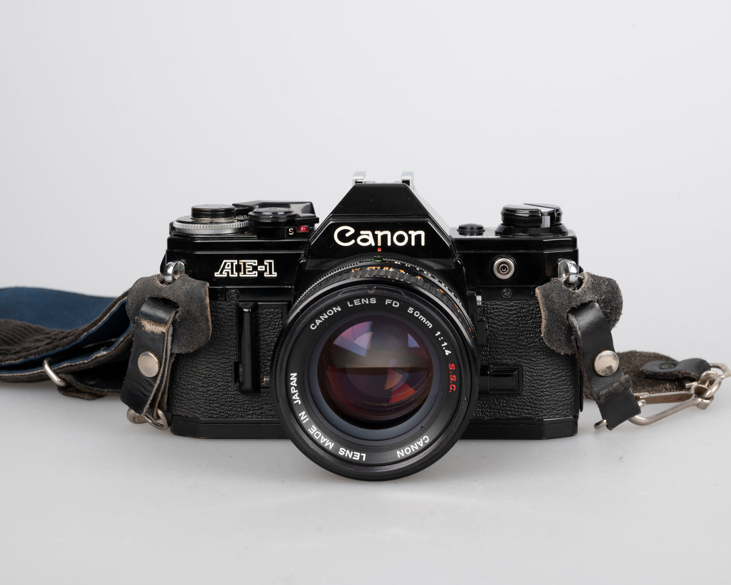 Canon AE-1 35mm SLR w/ Canon FD 50mm f1.4 S.S.C. lens + original manual (serial 291207)