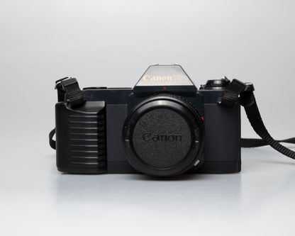 Canon T50 35mm film SLR camera w/FD 50mm f1.8 lens (serial 1316532)
