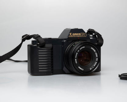 Canon T50 35mm film SLR camera w/FD 50mm f1.8 lens (serial 1316532)