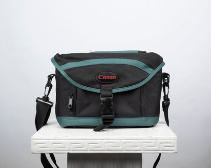 Canon black and green mid-sized camera shoulder bag