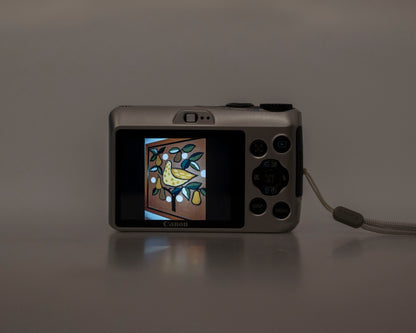 Canon Powershot A1200 digicam w/ 12 MP CCD sensor w/ 4GB SD card (serial 30216200163)