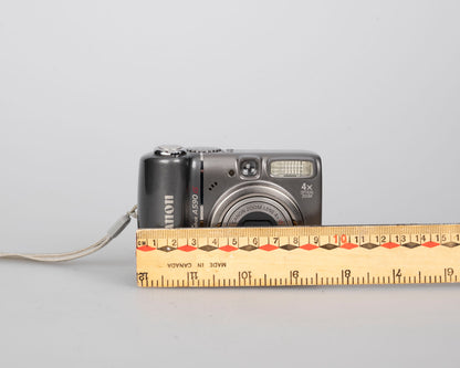 Canon Powershot A590 IS digicam w/ 8 MP CCD sensor; includes 512MB SD card (uses AA batteries)