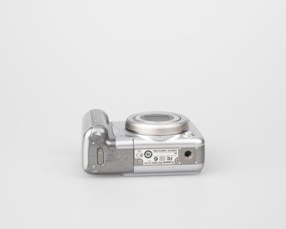 Canon Powershot A720 IS digicam w/ 8 MP CCD sensor (uses AA batteries and SD memory cards)